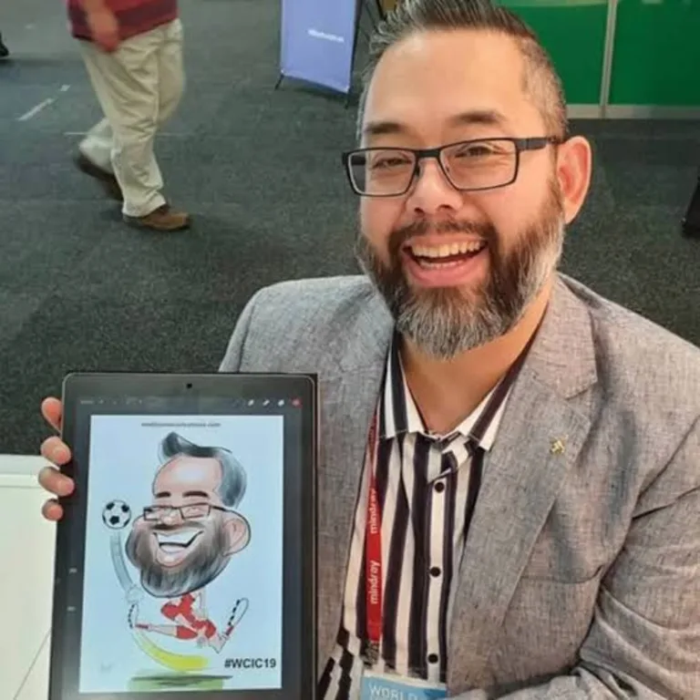 Guest holding a tablet with his soccer-themed digital caricature at a conference